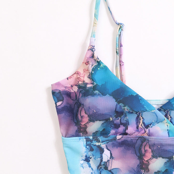 Dame bikini-sæt med asymmetrisk snit og florale accenter Stilla