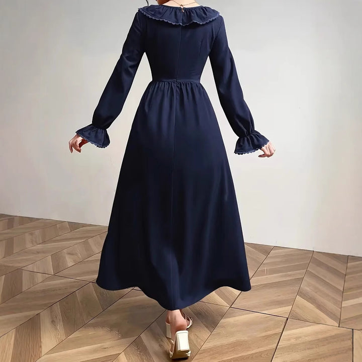 Dame Maxikjole med elegante flæsedetaljer og lange ærmer Stilla