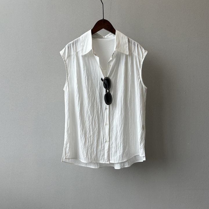Dame casual blouse med elegant ståkrave og unik knapdetaljering Stilla