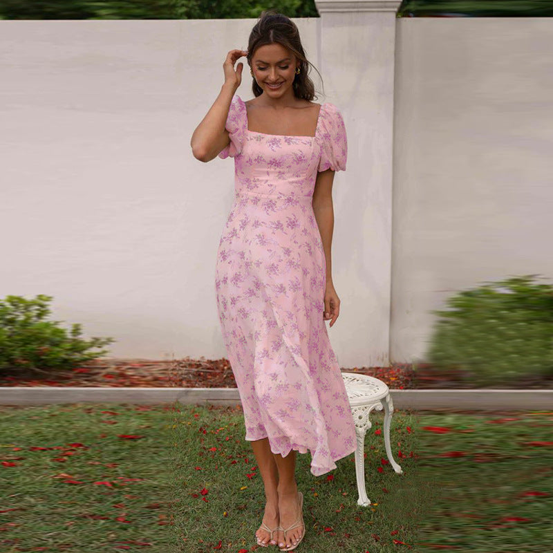 Dames midikjole med puffærmer og elegant blomstertryk Stilla