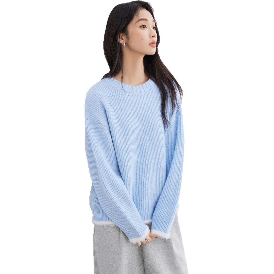 Kvinders fluffy sweater med en løs pasform og moderne ribbede detaljer Stilla