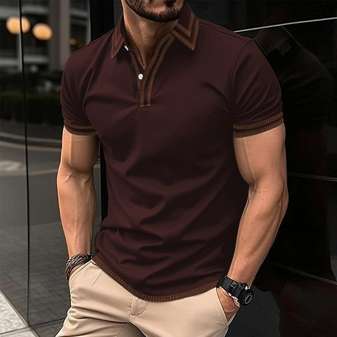 Stilfuld herre-polo med trendy broderidetaljer Stilla