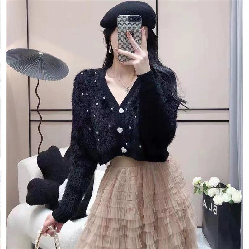 Kvinders fluffy cardigan med glitrende detaljer og moderne snit Stilla