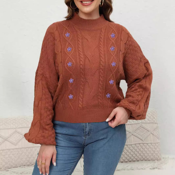 Dame strikkepullover med floralt broderi og afslappet snit Stilla