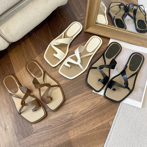 Dame slide-sandaler med moderne krydsriemedesign og komfortabel fodseng Stilla