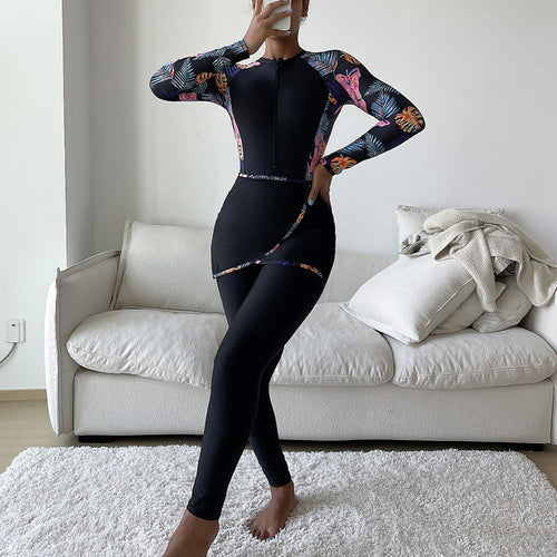 Dame Sporty badedragt med UV-beskyttelse og feminint indpakningsdesign Skovae