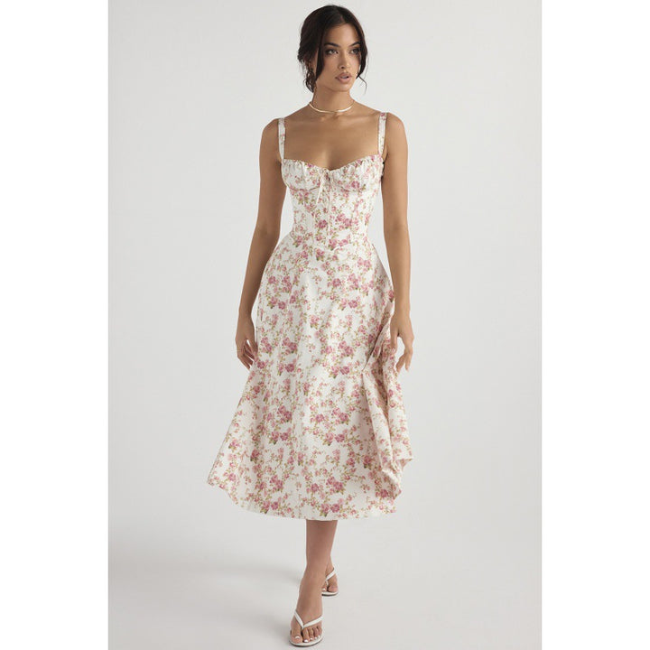 Dame maxikjole med floral design og elegant slids Skovae