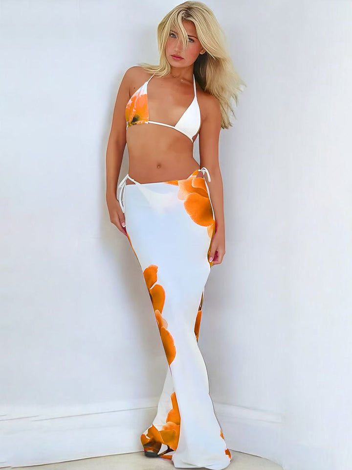 Dame bikini-sæt med elegant indpakningsskørt og blomsterdesign Skovae