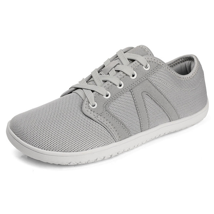 Unisex nan minimalistiske City sneakers med fint masket tekstiloverdel, polstret indgang og fleksibel gummisål Skovae