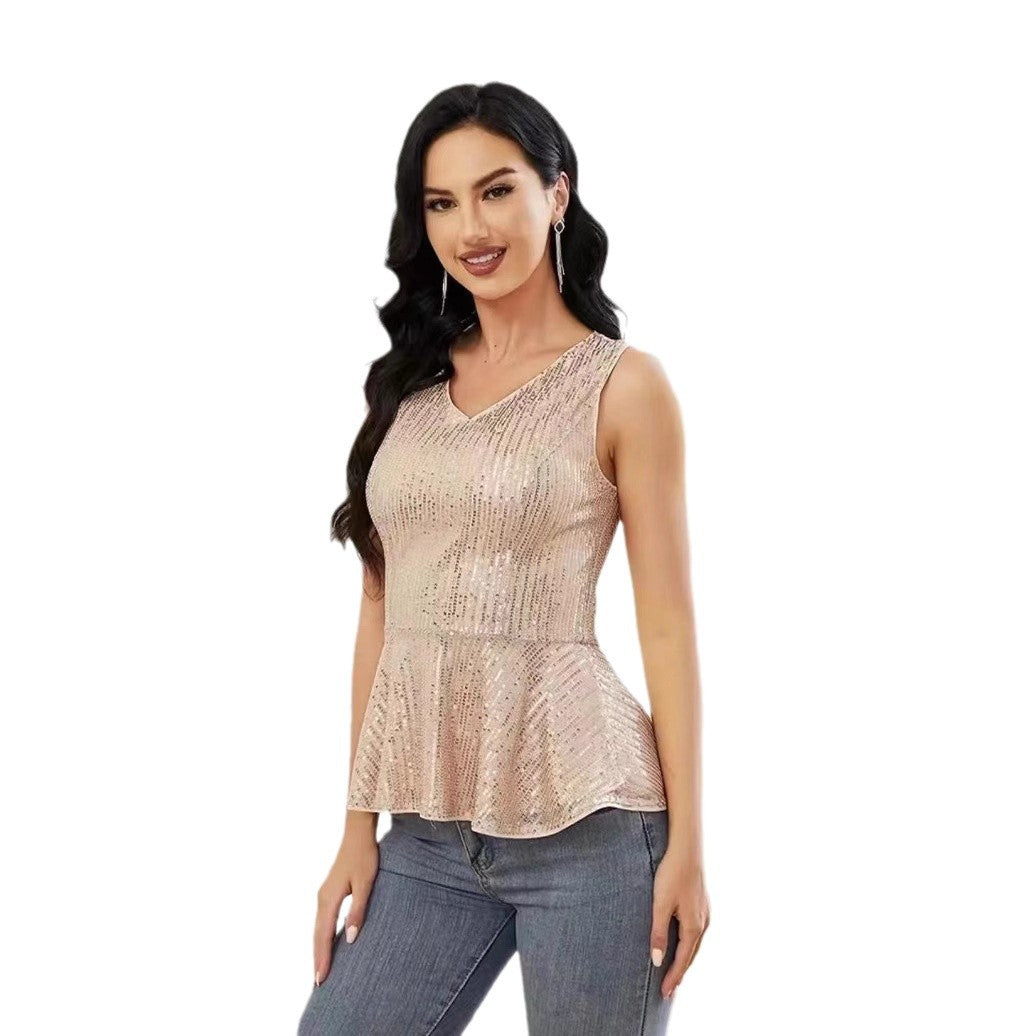 Dame Peplum top med skinnende pailletdetaljer og elegant snit Stilla