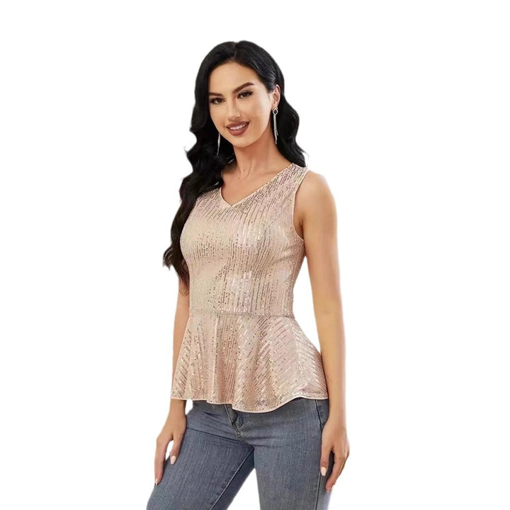 Dame Peplum top med skinnende pailletdetaljer og elegant snit Stilla