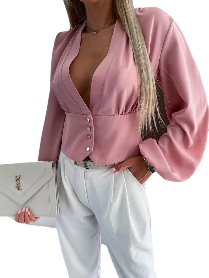 Dame elegant bluse med figursyet snit og markante knapdetaljer Stilla