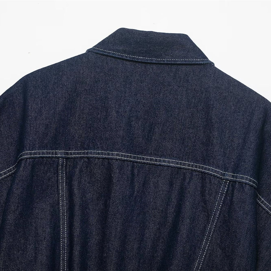 Dame Oversize Denim-Bluse med praktiske lommer og elastisk bund Skovae