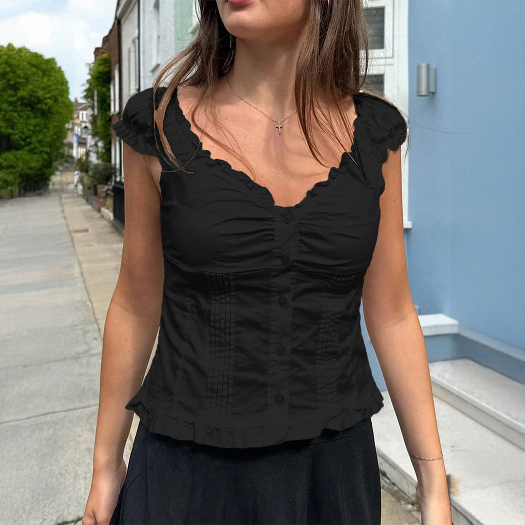 Damebluse med flæser og knaplukning Stilla