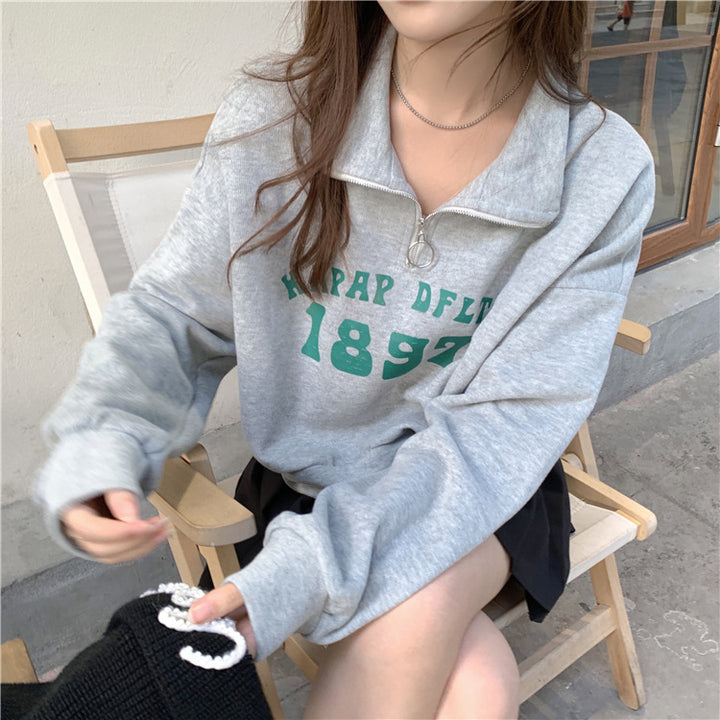 Femme Fjerdedel-Zip Grafik Sweatshirt Stilla