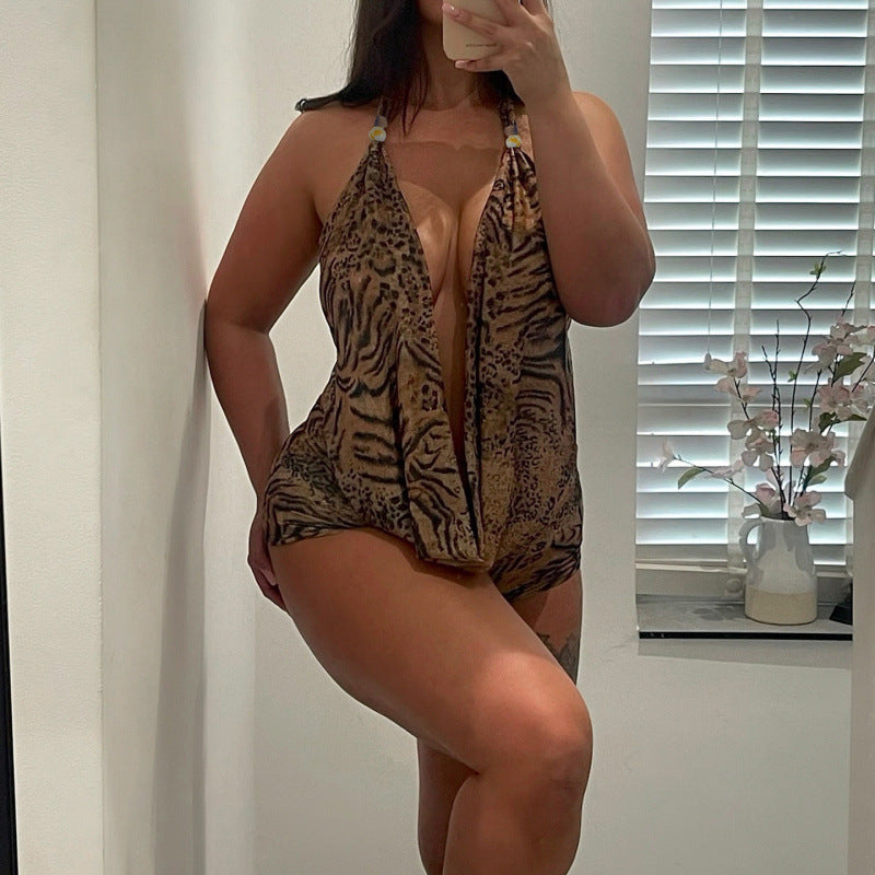 Dame elegant jumpsuit med dyb V-udskæring og legesyg dyreprint Skovae