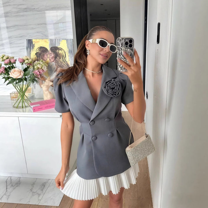 Damer elegant blazer med puffærmer og blomsterdetalje Skovae