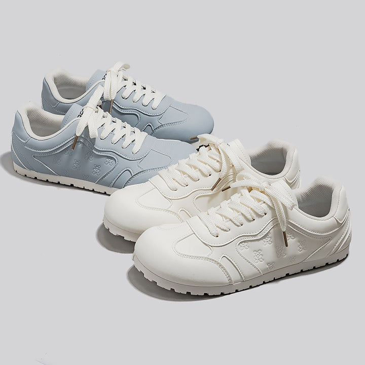 Dame Sneakers i sporty-elegant design med blomster mønster og skridsikker sål Stilla