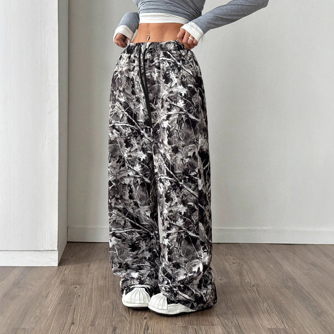 Damer Behagelige fritidshose med blomsterdesign og elastisk talje Stilla