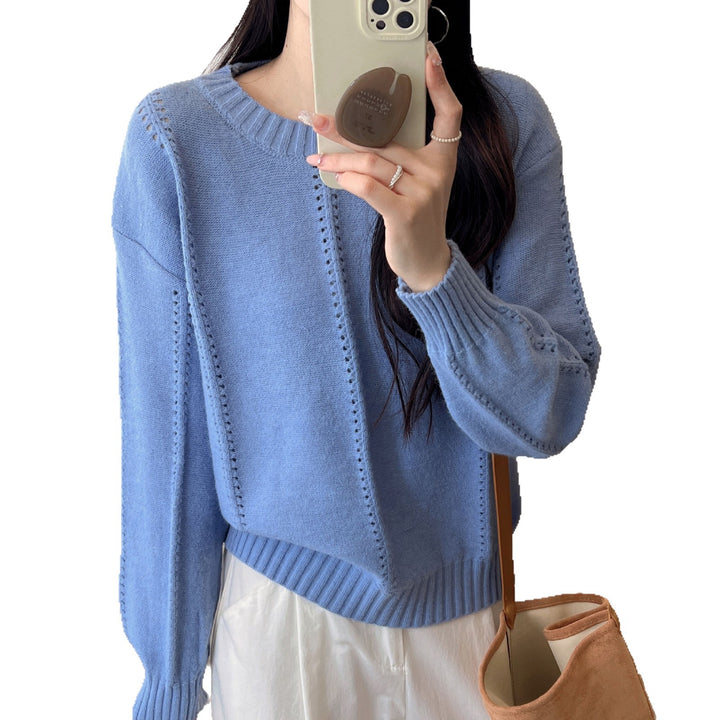 Kvinders chunky strikket sweater med en feminin silhuet og tekstureret design Stilla
