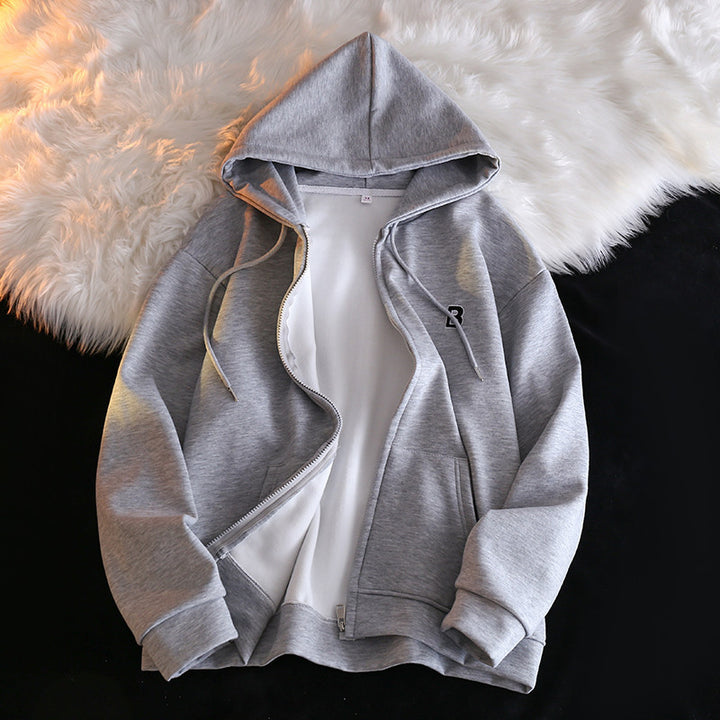 Femme Cozy Zip-Up Hoodie med elegant broderet detalje Stilla