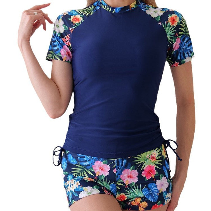 Dame Sporty badetøj med floral mønsterdetalje og figursyet snit Stilla