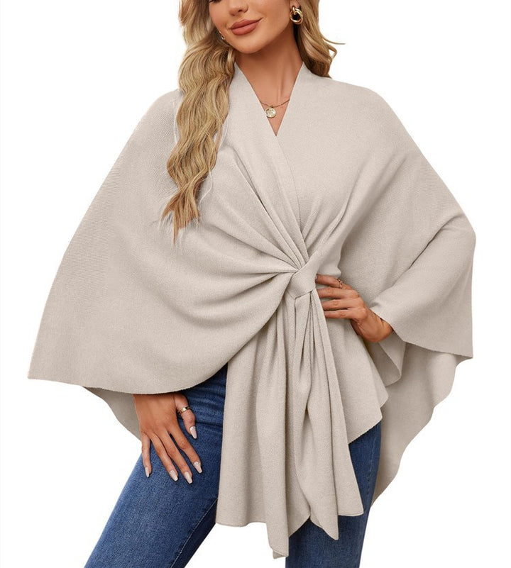 Dame elegant strikkeponcho med raffinerede draperinger og taljebælte Stilla