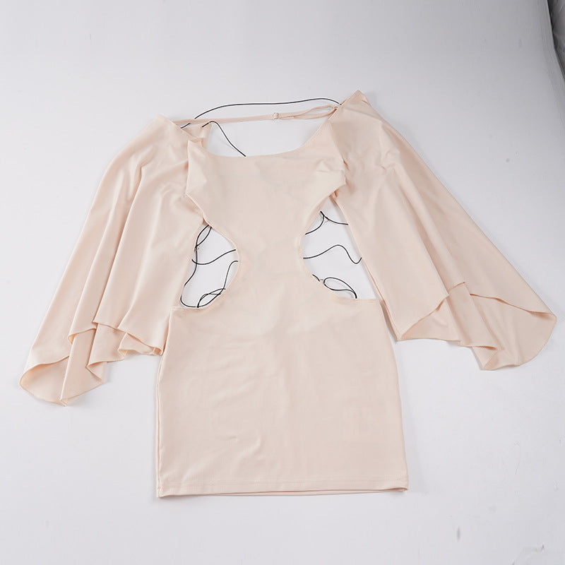 Damekjole med off-shoulder design og raffinerede cut-out-detaljer Skovae