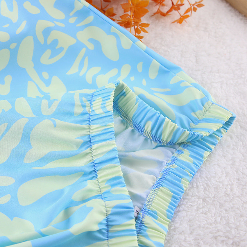 Dame usædvanligt pyjamas-sæt med store geometriske mønstre og lette, åndbare materialer Stilla