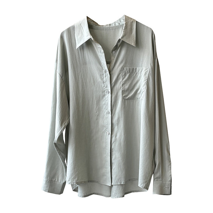 Dame elegant og luftig bluse med praktiske brystlommer og subtile ruffle detaljer Stilla