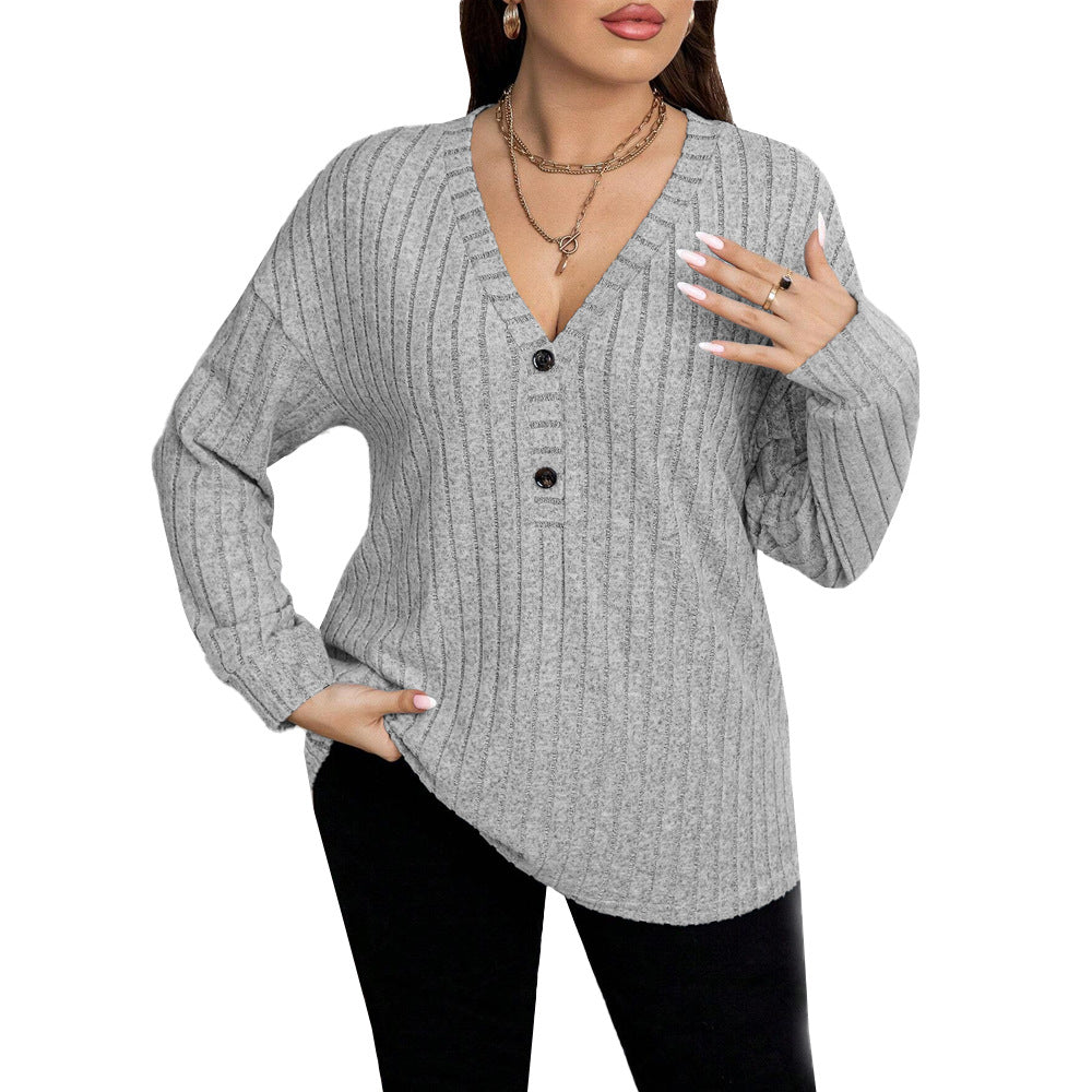 Dame strikket pullover med V-hals og knapdetaljer Stilla