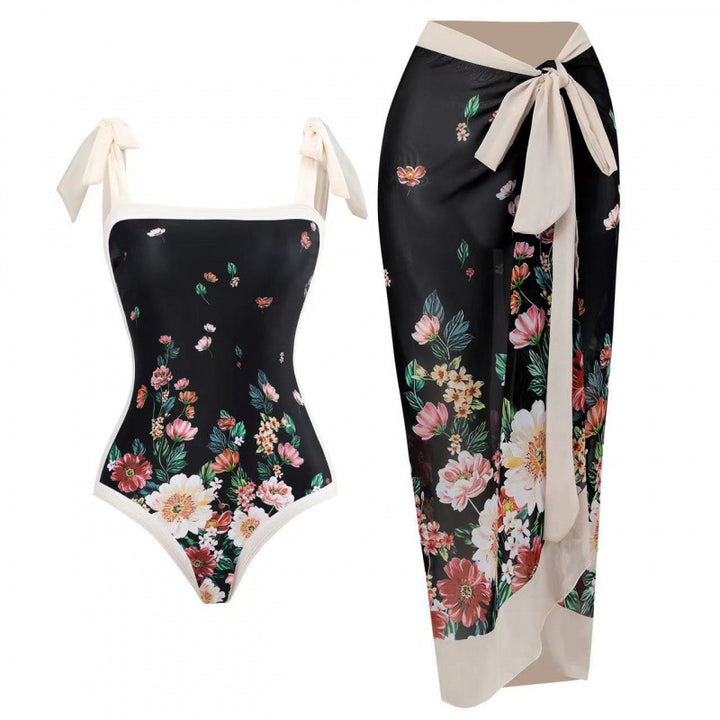 Dame Én-delt Badedragt med stilfuld Wrap Skirt og moderigtigt mønster Skovae