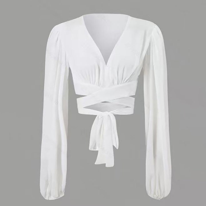 Dame indpakningsbluse med lange ærmer og elegant V-hals Skovae