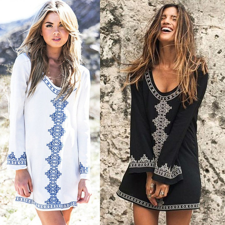 Dame fritidskjole med elegant V-udskæring og håndlavede broderidetaljer Stilla