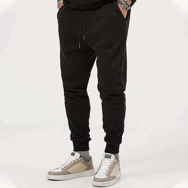 Herre nan Jersey-sweatpants i konisk snit med skjult snor og formstabile fodbånd Skovae