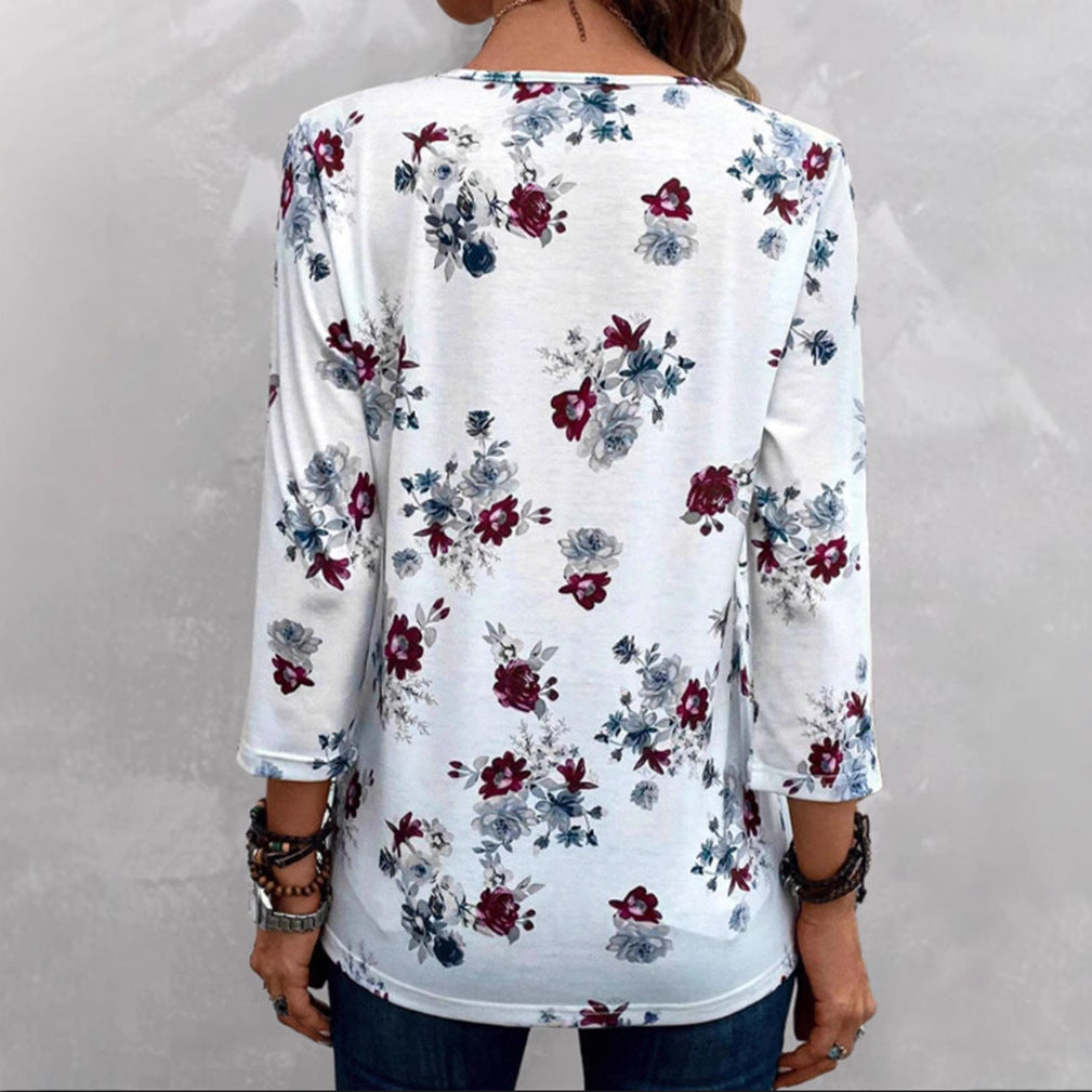 Kvinders bluse med blomsterprint og knapdetaljer Stilla