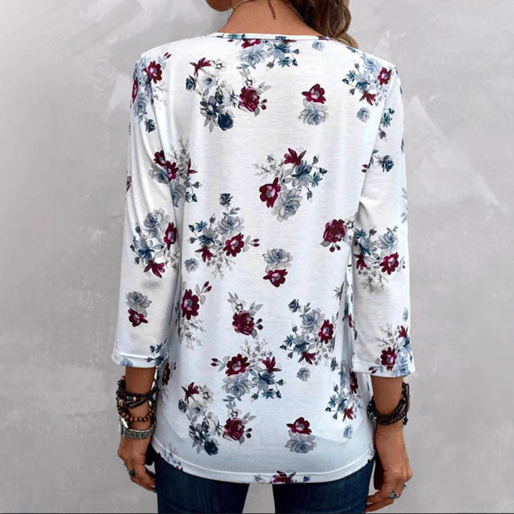 Kvinders bluse med blomsterprint og knapdetaljer Stilla