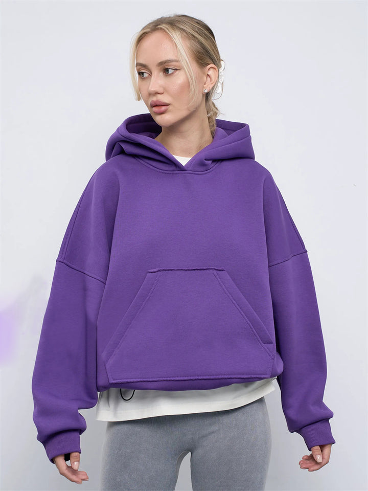 Dame oversized hoodie med kængurulomme og elastiske manchetter