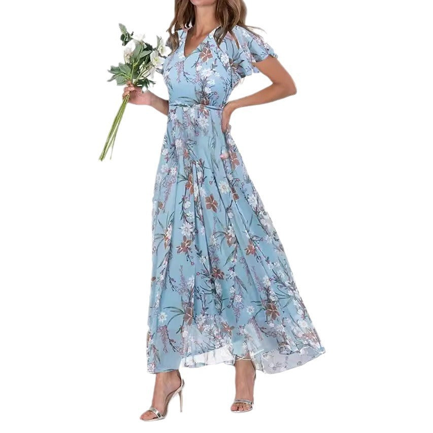 Dame maxikjole med flydende chiffon, sarte flæse detaljer og blomstrende mønster Stilla