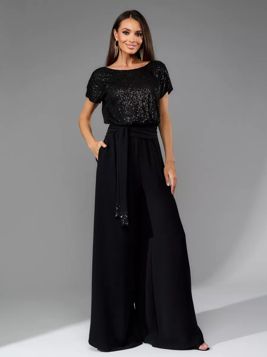 Dame glamourøs stil-outfit med glitrende top og bred pasform Skovae
