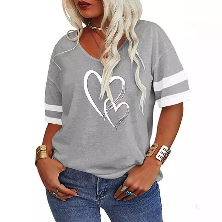 Damer afslappet T-shirt med kreativt hjerte design og sporty ærmer Stilla