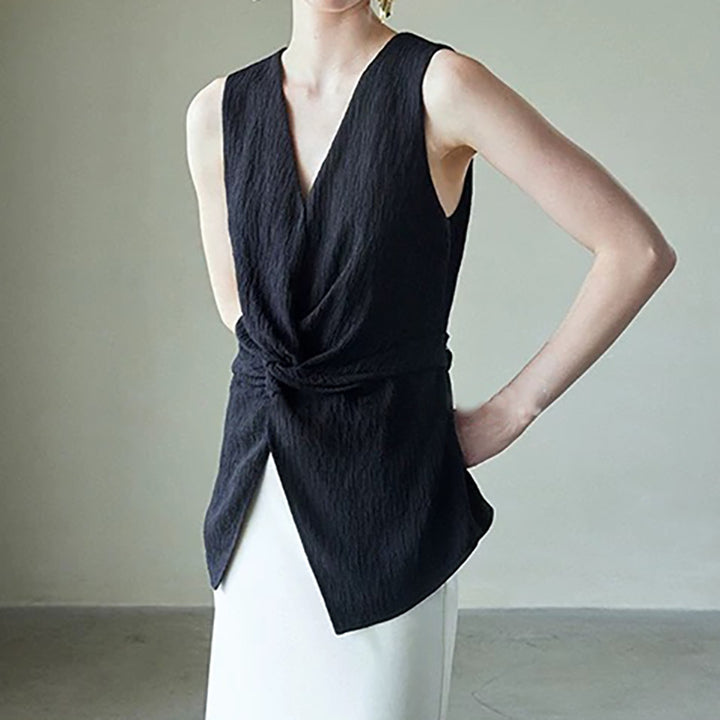 Dame indpakningsoverdel med asymmetrisk design og fint struktureret materiale Stilla
