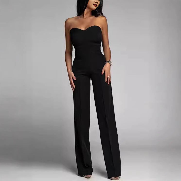Dame elegant jumpsuit med off-shoulder design og vid ben Skovae