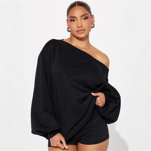 Kvinders oversized sweatshirt med asymmetrisk halsudskæring og ballonformede ærmer