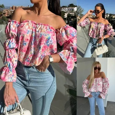 Dame Off-Shoulder Bluse med voluminiøse ærmer og floral design Stilla
