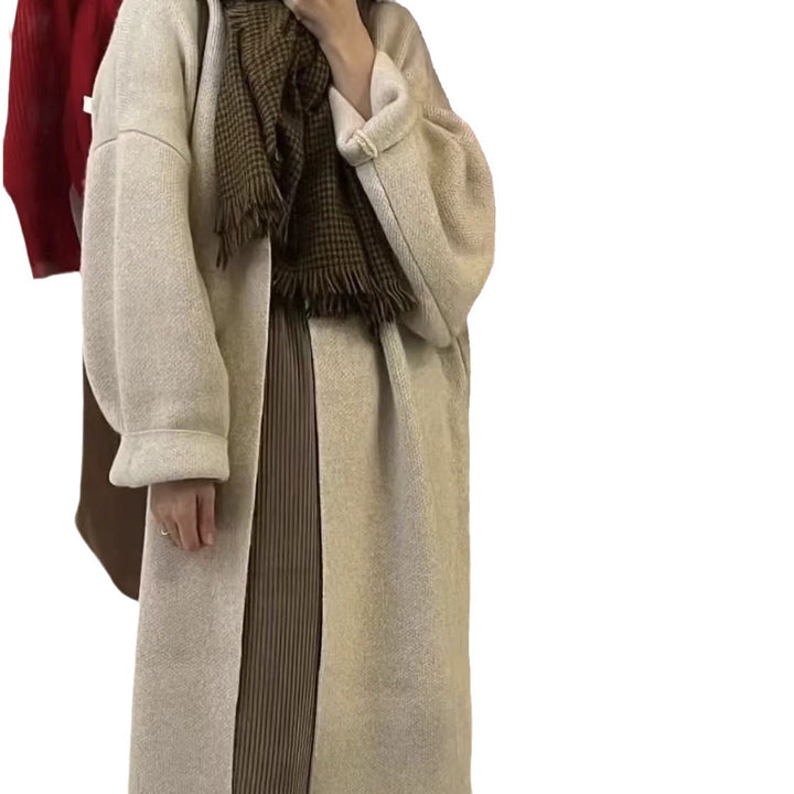 Dame lang strikjakke med oversized pasform og blødt fleecefor
