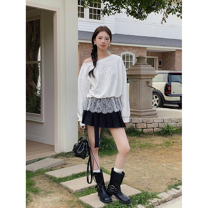 Dame afslappet sweatshirt med trendy asymmetrisk design og dekorative rhinestone-detaljer Stilla