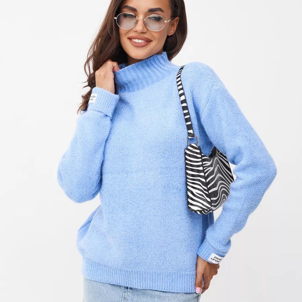 Kvinders højhalset sweater lavet af blød strik Stilla