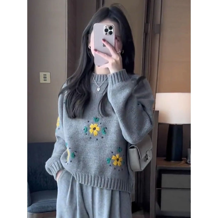 Women's knitted sweater with floral design Stilla