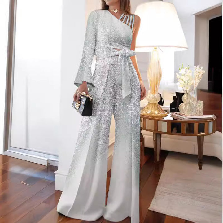 Dame elegant ensidig jumpsuit med glimmerdetaljer og bred ben Stilla